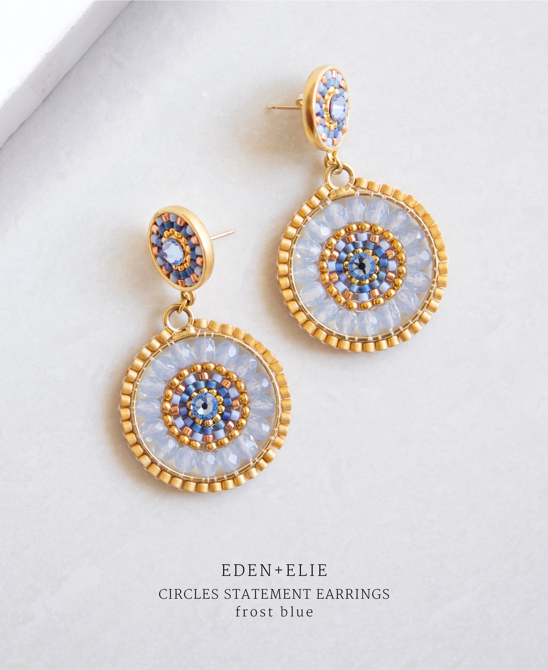 EDEN + ELIE double circle statement drop earrings - frost blue
