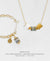 Gold Charm Bracelet + Adjustable Length Necklace Set - Spirit of Place City Steel